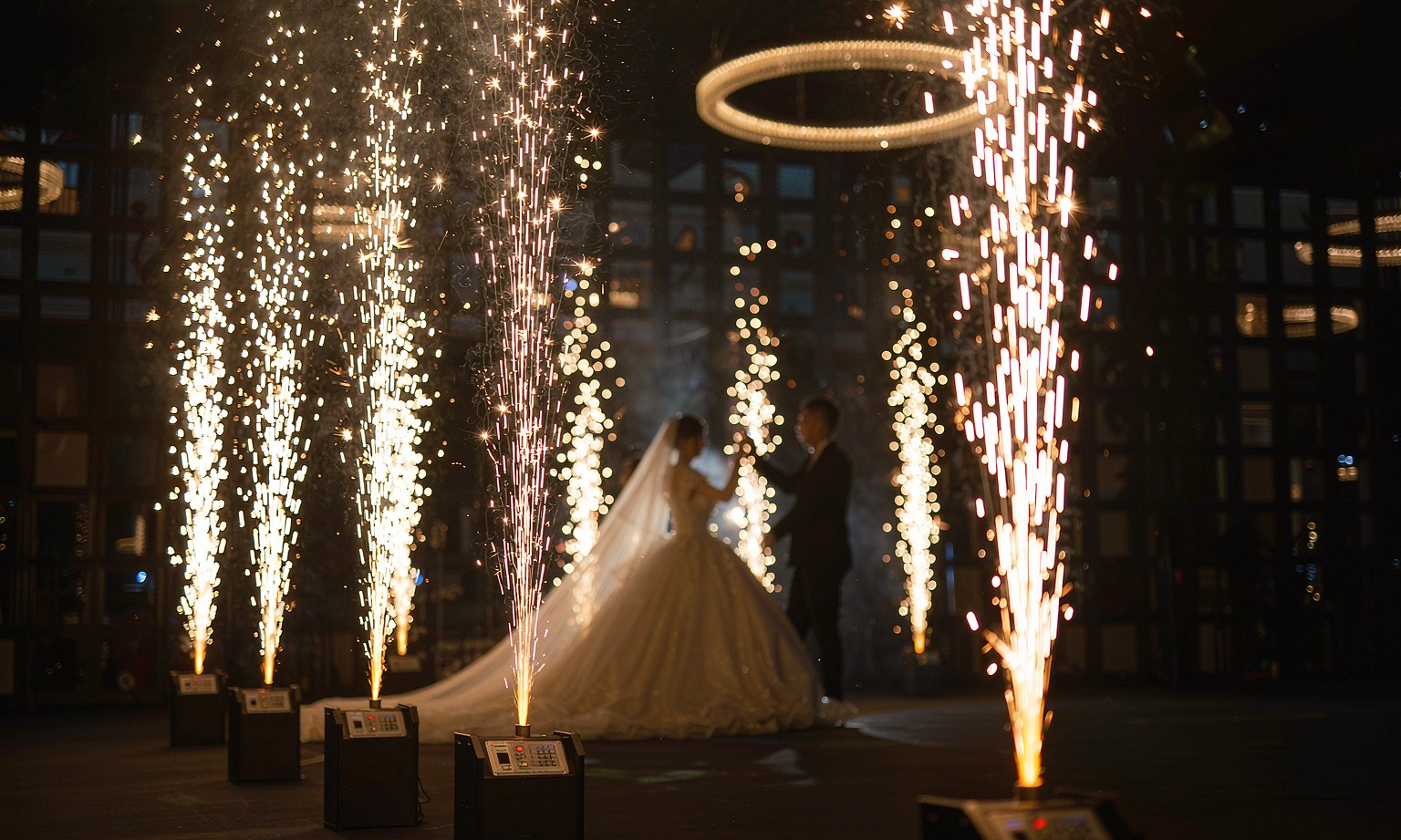 Cold spark fountains lighting up a wedding first dance